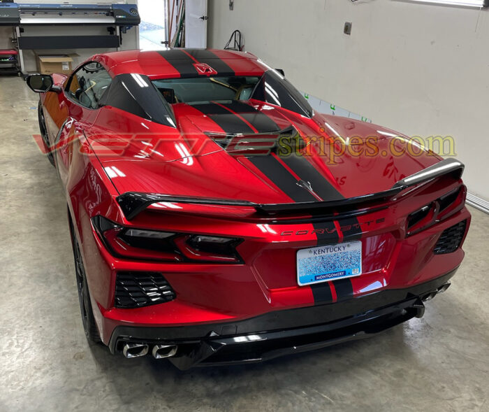 Red mist C8 Corvette convertible with gloss carbon flash racing stripes wider rear