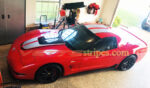 Torch red C5 Corvette with MCM hood CE stripes