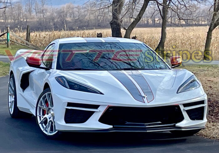 White C8 Corvette Stingray coupe with 2024 racing stripes gloss silver flare and torch red